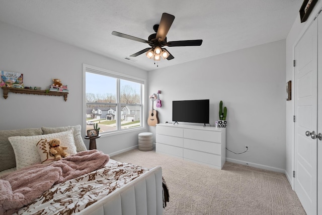 221 Wesson Dr, Clarksville, TN 37043 - carpeted bedroom featuring baseboards, ceiling fan, and visible vents