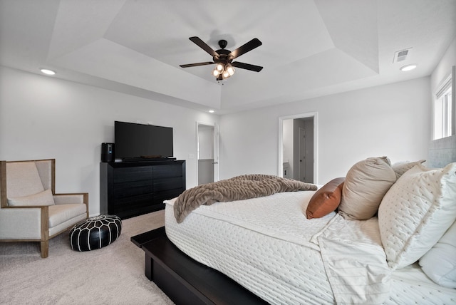 221 Wesson Dr, Clarksville, TN 37043 - carpeted bedroom with a ceiling fan, a raised ceiling, and visible vents