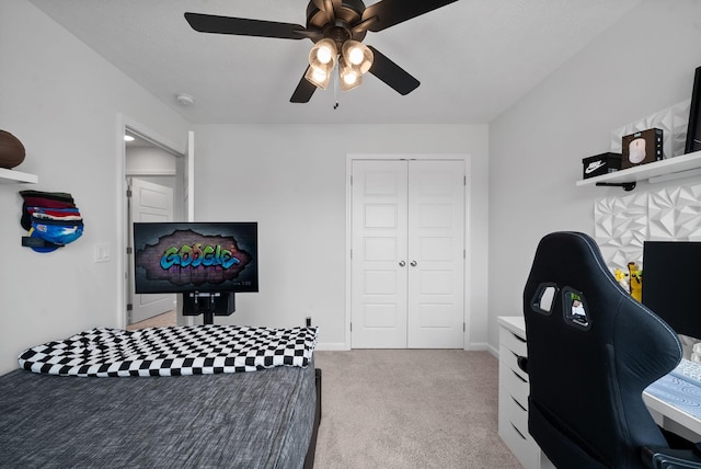 221 Wesson Dr, Clarksville, TN 37043 - carpeted bedroom with a closet, ceiling fan, and baseboards