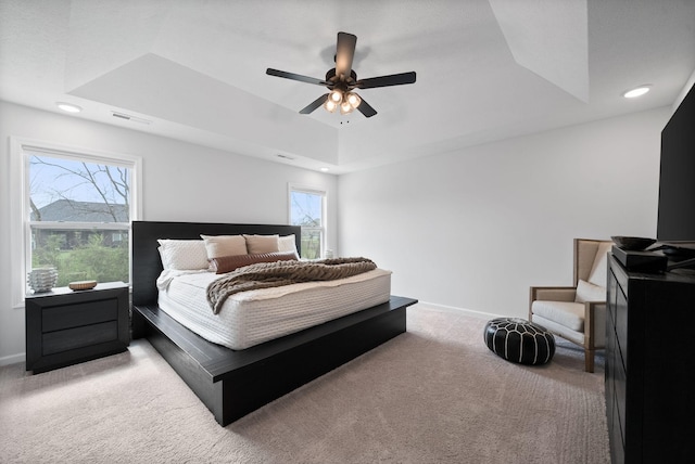 221 Wesson Dr, Clarksville, TN 37043 - bedroom featuring a raised ceiling, baseboards, visible vents, ceiling fan, and carpet