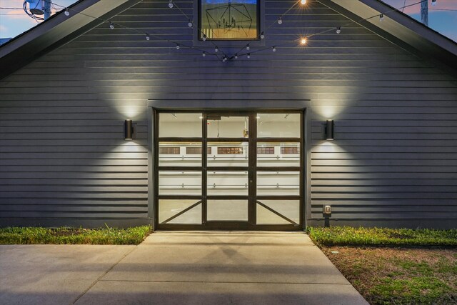924 Gilmore Ave, Nashville, TN 37204 - view of exterior entry with an attached garage and concrete driveway