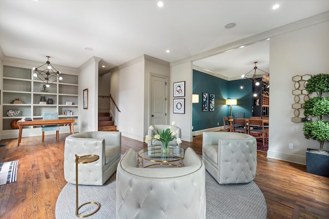924 Gilmore Ave, Nashville, TN 37204 - living room featuring wood finished floors, stairway, and a notable chandelier