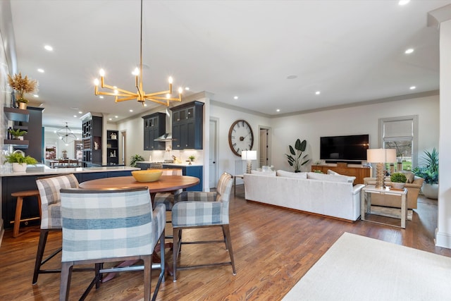 924 Gilmore Ave, Nashville, TN 37204 - dining space featuring dark wood-type flooring, an inviting chandelier, recessed lighting, and crown molding