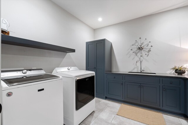 924 Gilmore Ave, Nashville, TN 37204 - laundry area with independent washer and dryer, cabinet space, a sink, and light tile patterned floors
