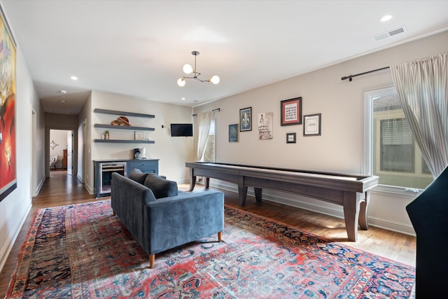 924 Gilmore Ave, Nashville, TN 37204 - living area with an inviting chandelier, visible vents, recessed lighting, and wood finished floors