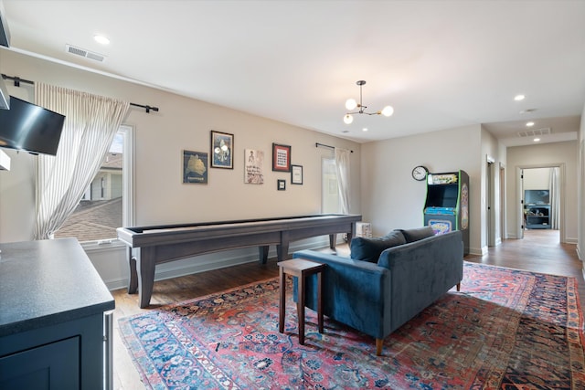 924 Gilmore Ave, Nashville, TN 37204 - living room featuring visible vents, light wood-style flooring, recessed lighting, and a chandelier