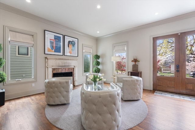 924 Gilmore Ave, Nashville, TN 37204 - living area with a wealth of natural light, a fireplace, wood finished floors, and french doors