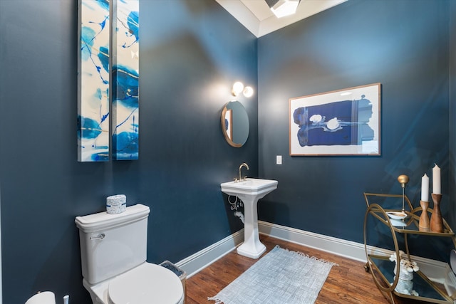 924 Gilmore Ave, Nashville, TN 37204 - bathroom with baseboards, toilet, wood finished floors, and a sink
