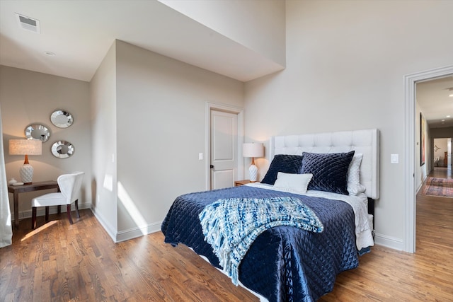 924 Gilmore Ave, Nashville, TN 37204 - bedroom with baseboards, visible vents, and wood finished floors
