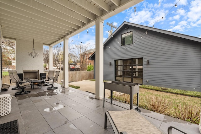 924 Gilmore Ave, Nashville, TN 37204 - view of patio / terrace featuring fence and a large fireplace