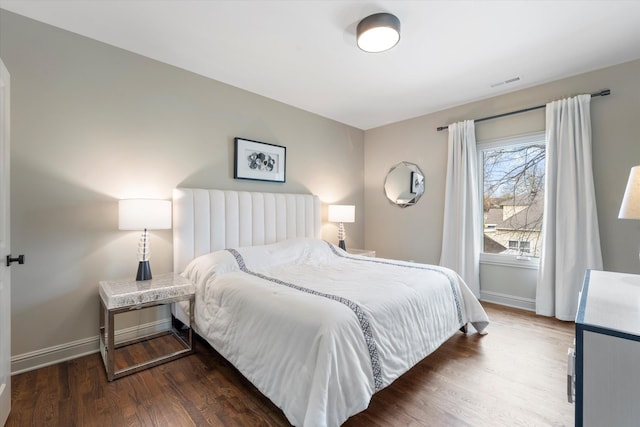 924 Gilmore Ave, Nashville, TN 37204 - bedroom with visible vents, baseboards, and wood finished floors