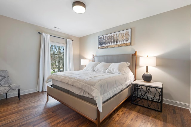 924 Gilmore Ave, Nashville, TN 37204 - bedroom featuring baseboards, visible vents, and wood finished floors