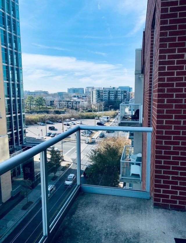 balcony featuring a view of city