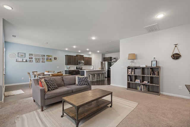 1424 Old Stone Rd NW, Lebanon, TN 37087 - living area featuring baseboards, visible vents, and recessed lighting