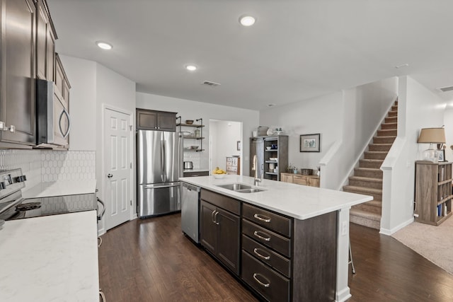 1424 Old Stone Rd NW, Lebanon, TN 37087 - kitchen featuring a sink, stainless steel appliances, dark brown cabinetry, and visible vents