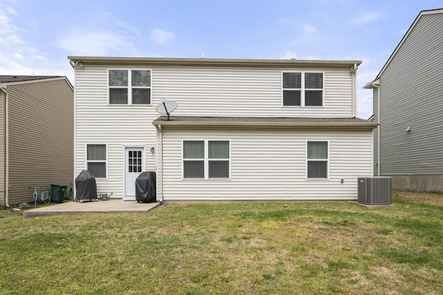 1424 Old Stone Rd NW, Lebanon, TN 37087 - rear view of property with a patio, central AC, and a yard