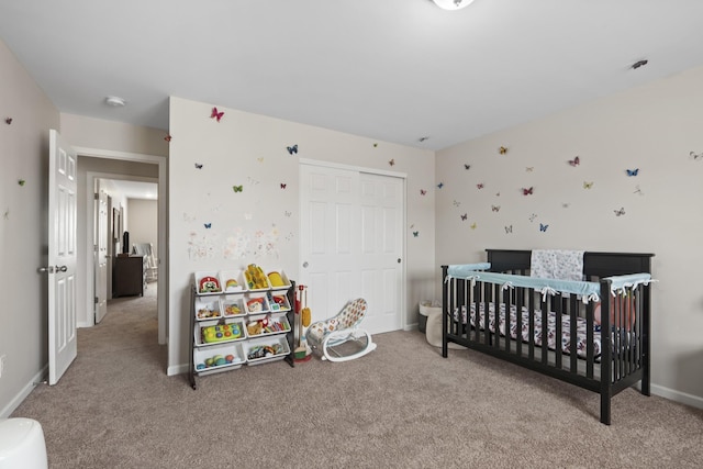 1424 Old Stone Rd NW, Lebanon, TN 37087 - carpeted bedroom with a closet, a nursery area, and baseboards