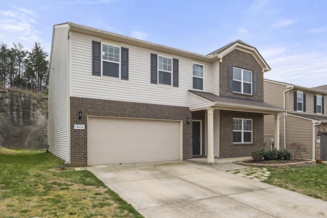 1424 Old Stone Rd NW, Lebanon, TN 37087 - view of front of house with driveway, a front yard, a garage, and brick siding