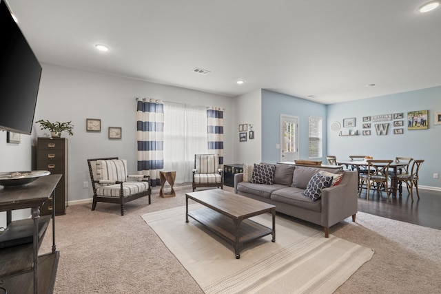1424 Old Stone Rd NW, Lebanon, TN 37087 - living area featuring plenty of natural light, light colored carpet, and visible vents