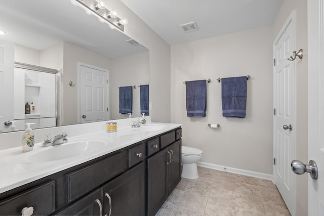 1424 Old Stone Rd NW, Lebanon, TN 37087 - full bath with toilet, a sink, baseboards, visible vents, and double vanity