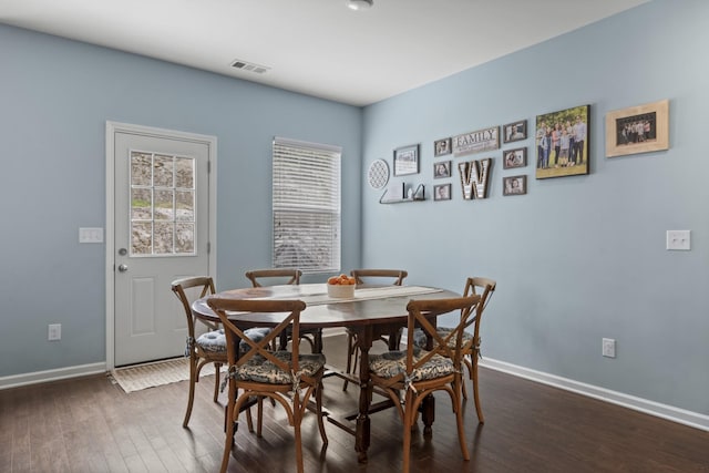 1424 Old Stone Rd NW, Lebanon, TN 37087 - dining area featuring dark wood-style floors, baseboards, and visible vents