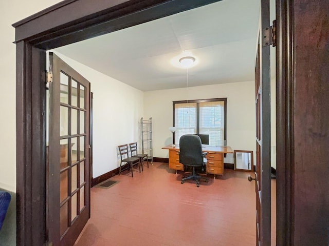 home office with baseboards, visible vents, and french doors
