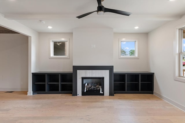 unfurnished living room featuring baseboards, a ceiling fan, wood finished floors, and recessed lighting
