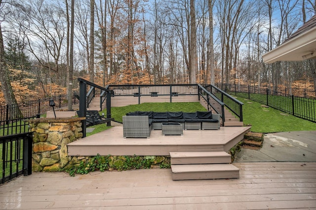 deck featuring fence, stairway, outdoor lounge area, and a lawn