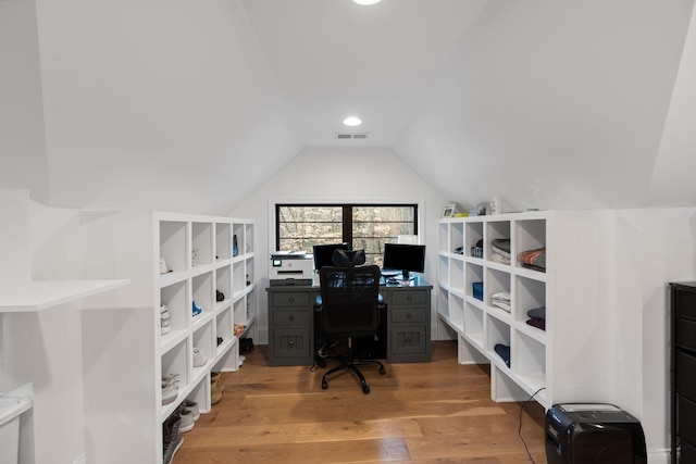 office with lofted ceiling, visible vents, recessed lighting, and light wood-type flooring
