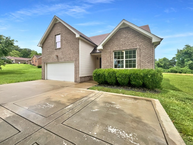 851 Salem Rd, Clarksville, TN 37040 - traditional-style home with brick siding, a garage, a front yard, and concrete driveway