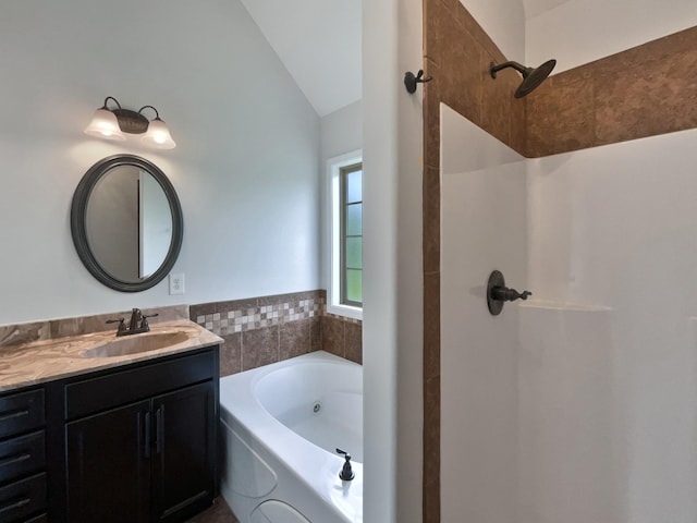 851 Salem Rd, Clarksville, TN 37040 - full bathroom featuring vanity, a whirlpool tub, vaulted ceiling, and a shower