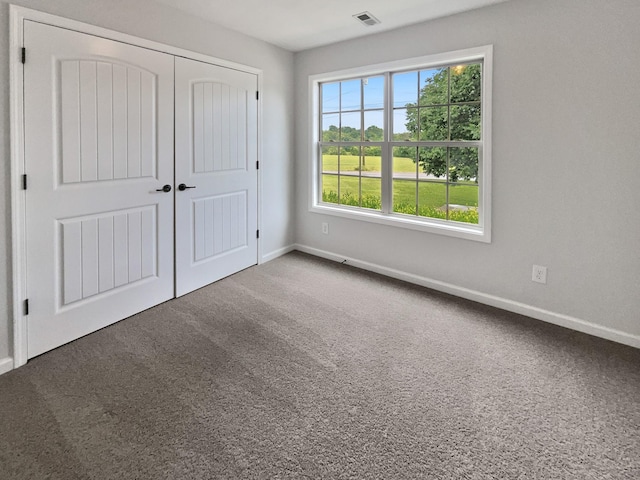 851 Salem Rd, Clarksville, TN 37040 - unfurnished bedroom featuring baseboards, carpet floors, and a closet