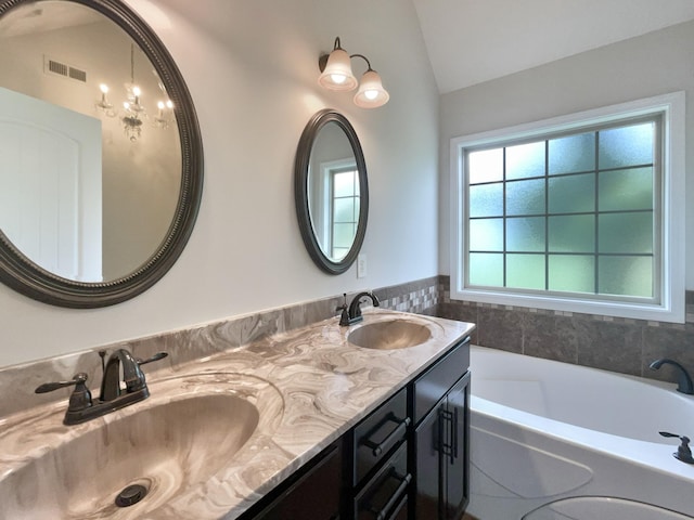 851 Salem Rd, Clarksville, TN 37040 - full bath with lofted ceiling, double vanity, and a garden tub