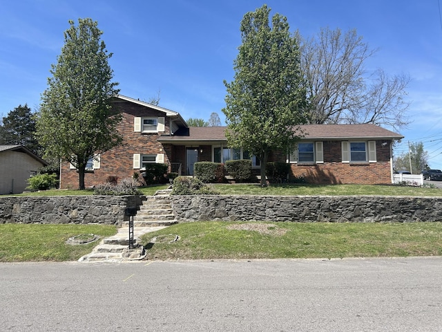 251 Sailboat Dr, Nashville, TN 37217 - split level home with brick siding, a front yard, and stairway