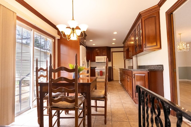 251 Sailboat Dr, Nashville, TN 37217 - dining space with a chandelier, crown molding, recessed lighting, and light tile patterned floors