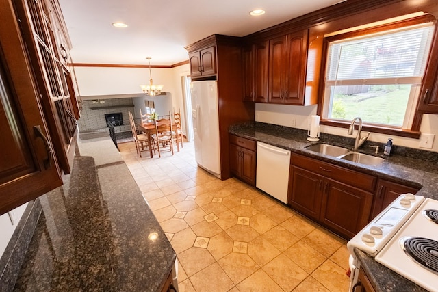 251 Sailboat Dr, Nashville, TN 37217 - kitchen with white appliances, a sink, a chandelier, pendant lighting, and dark stone countertops