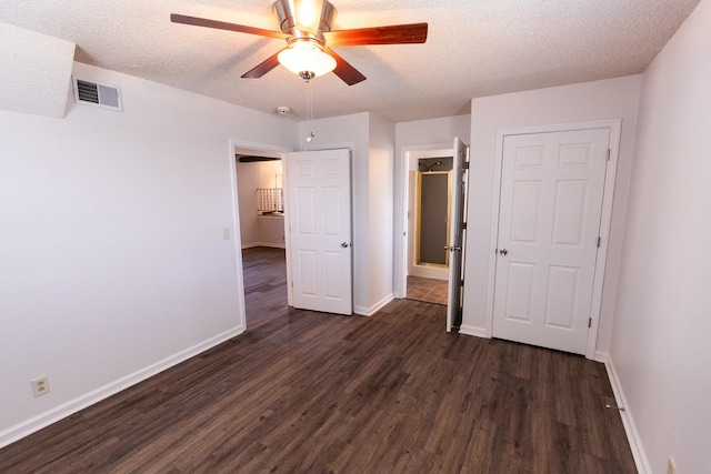 251 Sailboat Dr, Nashville, TN 37217 - unfurnished bedroom with dark wood-type flooring, a textured ceiling, baseboards, and ceiling fan