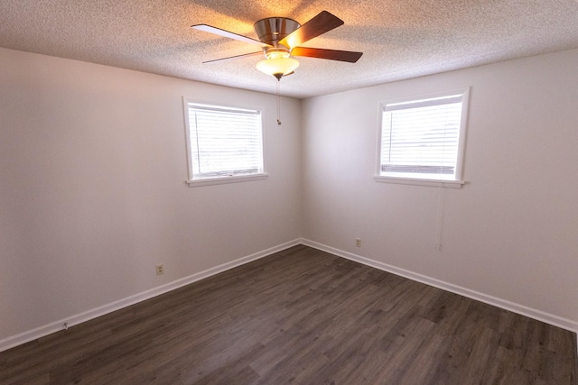 251 Sailboat Dr, Nashville, TN 37217 - unfurnished room with dark wood-style floors, a textured ceiling, healthy amount of natural light, and baseboards