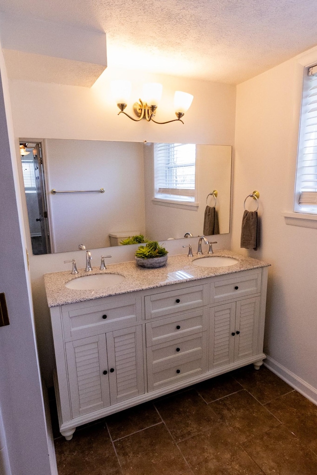 251 Sailboat Dr, Nashville, TN 37217 - full bath with double vanity, tile patterned flooring, baseboards, and a textured ceiling