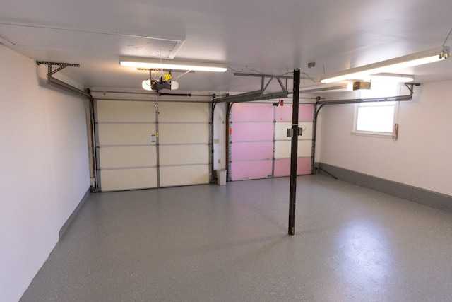 251 Sailboat Dr, Nashville, TN 37217 - garage featuring a garage door opener and baseboards