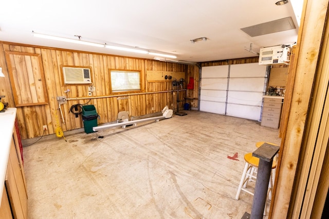 251 Sailboat Dr, Nashville, TN 37217 - garage featuring a wall mounted air conditioner and wooden walls