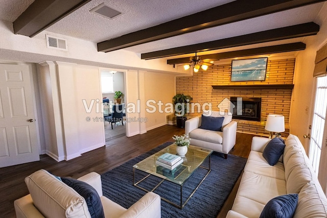251 Sailboat Dr, Nashville, TN 37217 - living area featuring a fireplace, beam ceiling, wood finished floors, baseboards, and a textured ceiling