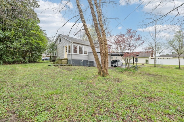 exterior space featuring central AC unit