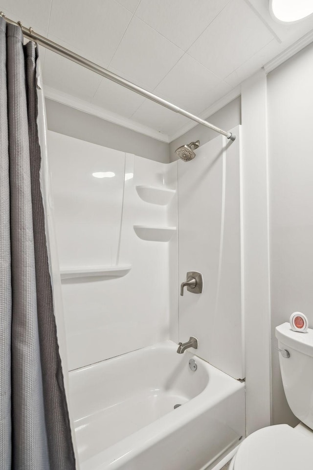 full bath with shower / tub combo and toilet