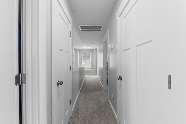 2037 Hamilton Hill Dr, Antioch, TN 37013 - corridor featuring baseboards, dark colored carpet, and visible vents