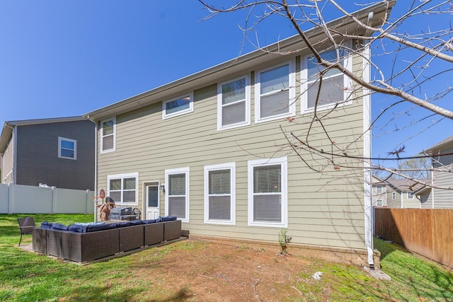 2037 Hamilton Hill Dr, Antioch, TN 37013 - rear view of house featuring outdoor lounge area, fence, and a yard
