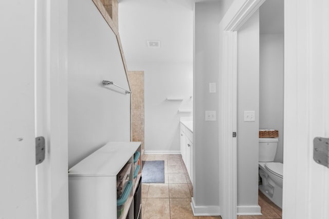 2037 Hamilton Hill Dr, Antioch, TN 37013 - bathroom featuring vanity, toilet, baseboards, and tile patterned floors