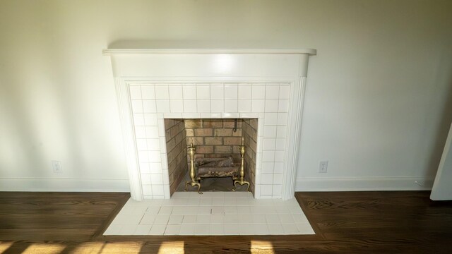 259 W End Hts, Lebanon, TN 37087 - interior details featuring baseboards, a tiled fireplace, and wood finished floors