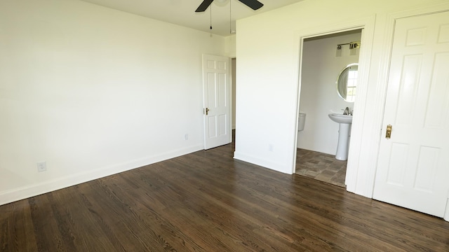 259 W End Hts, Lebanon, TN 37087 - unfurnished bedroom featuring connected bathroom, dark wood-style flooring, baseboards, and ceiling fan