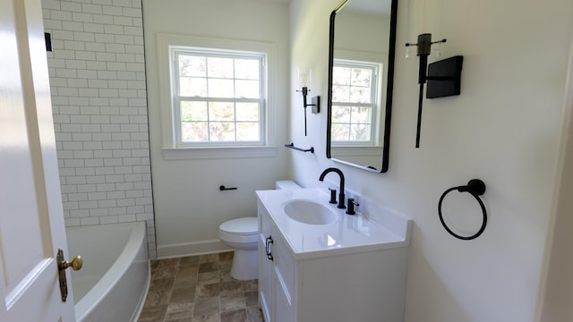 259 W End Hts, Lebanon, TN 37087 - full bathroom featuring vanity, baseboards, stone finish floor, and toilet